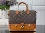 Louis Vuitton monogram handbag with tan leather trim and gold-tone front hardware