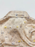 Beige short-sleeve shirt back yoke with monogram and colorful floral print