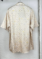 Beige short-sleeve button-up shirt, allover monogram and floral print