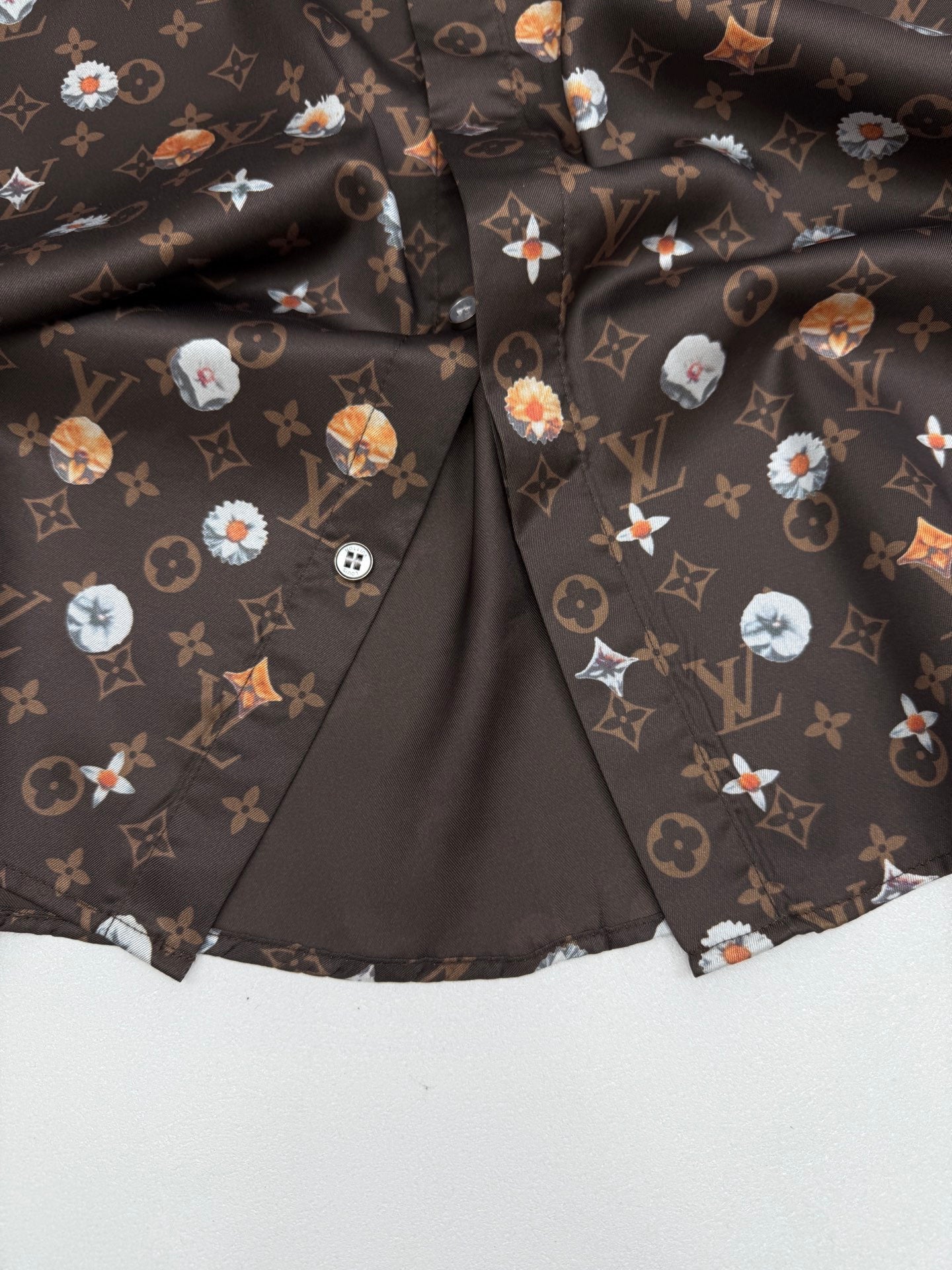 Louis Vuitton short-sleeve shirt, dark monogram print with colorful floral motifs, open placket