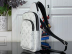 White Louis Vuitton monogram crossbody bag with dual front zipper pulls and strap