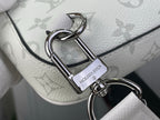 Silver D-ring clasp on white Louis Vuitton monogram crossbody strap