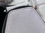 White textured Louis Vuitton leather panel with embossed Louis Vuitton logo