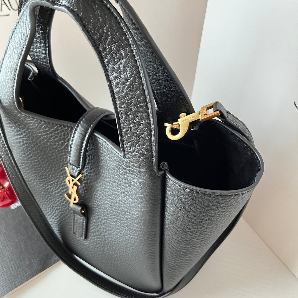 YSL leather mini tote bag, black interior view with gold-tone YSL clasp detail.