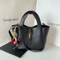 YSL leather mini tote bag, black with top handles and gold-tone YSL clasp.