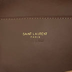 YSL brown leather patch with Saint Laurent Paris logo text and stitching