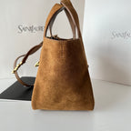 YSL tan suede mini tote with open top, structured shape, and shoulder strap