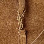YSL tan suede bag with YSL logo zipper pull and textured suede detail