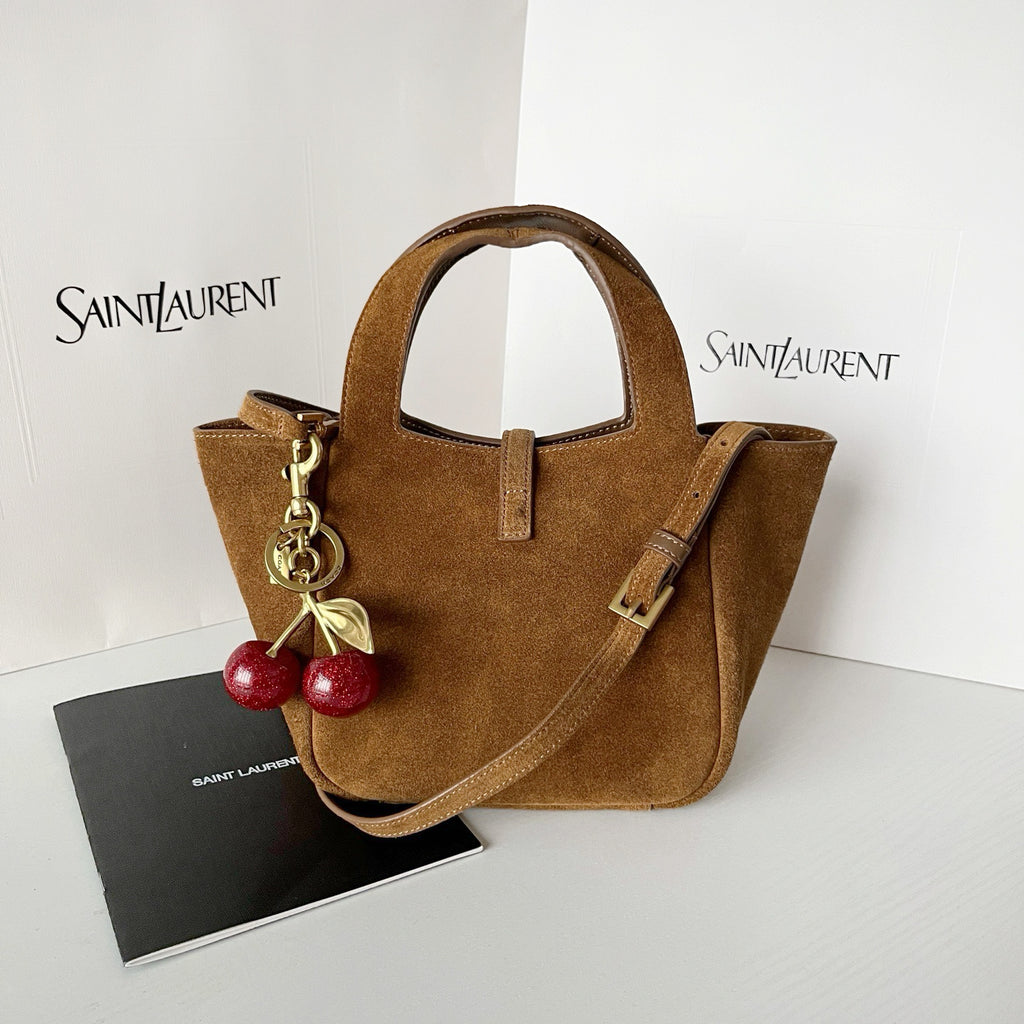 YSL tan suede mini tote with top handles, shoulder strap, and gold hardware charm