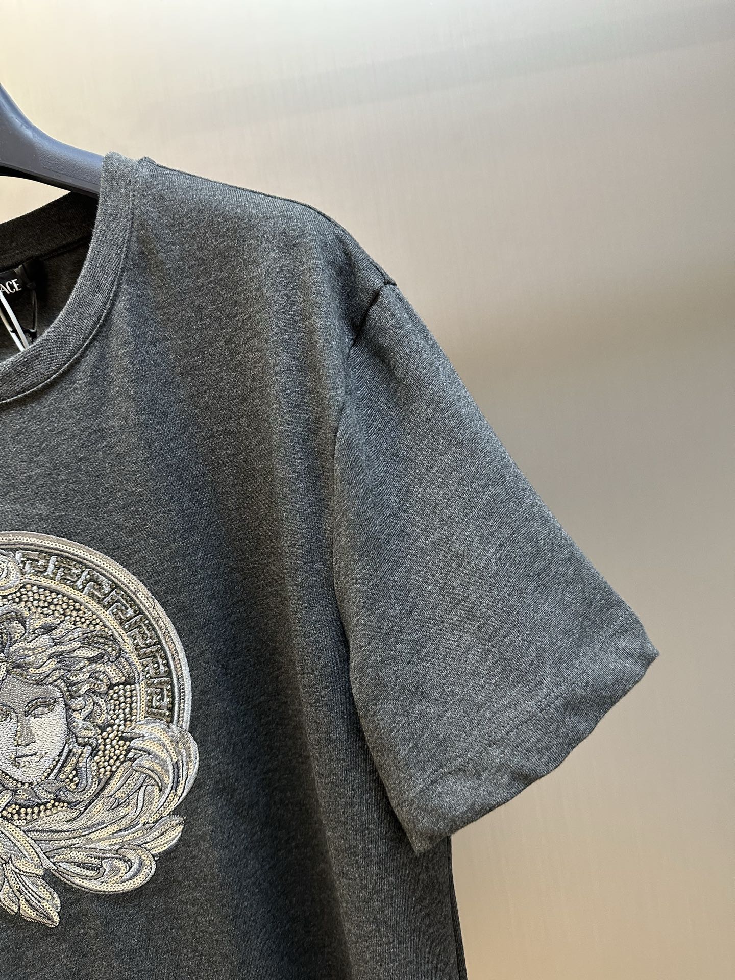 Versace T-shirt sleeve and front graphic, dark heather gray knit jersey