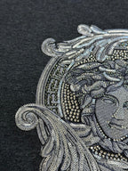 Versace Medusa front graphic close-up with bead and sequin-style detailing