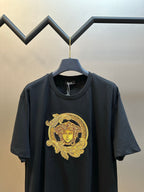Versace black T-shirt front view with gold Medusa crest on chest