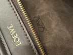 Gold zipper and embroidered Loewe logo on suede interior