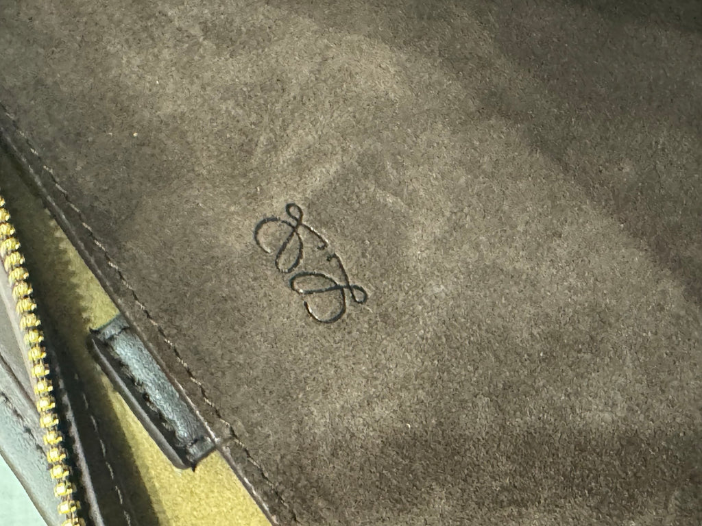Gold suede interior panel with embroidered Loewe logo