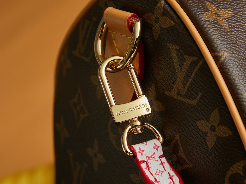 Louis Vuitton monogram bag key ring with engraved padlock charm