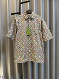Gucci short-sleeve shirt in light gray with multicolor logo print and button placket