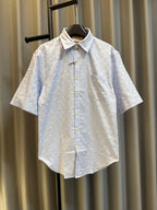 Gucci light blue monogram short-sleeve button-up shirt, front view with point collar