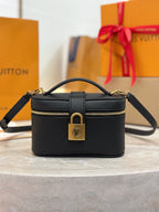 Louis Vuitton top-handle bag in dark black with gold zipper and front lock hardware