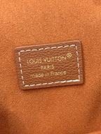 Louis Vuitton brown leather bag made in France label with stitched rectangular tag