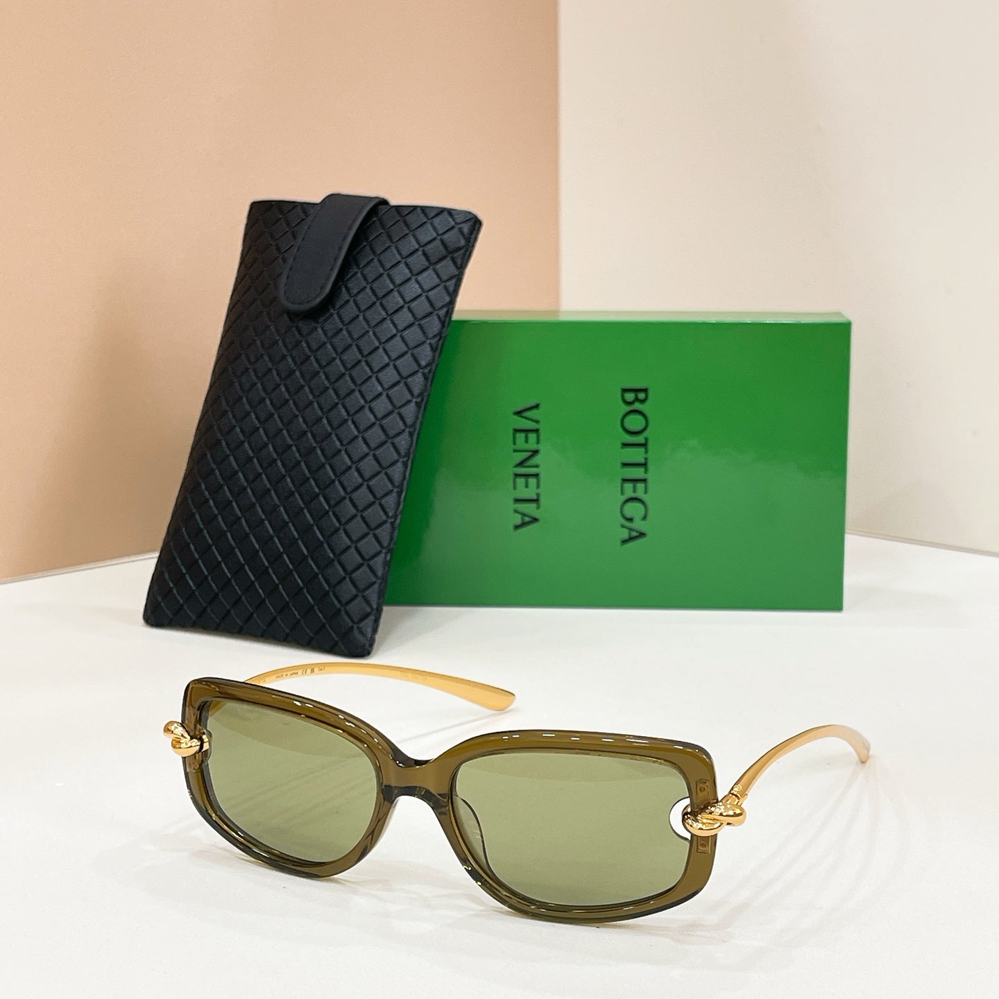 Bottega Veneta sunglasses, brown frames with olive lenses and gold-tone hardware