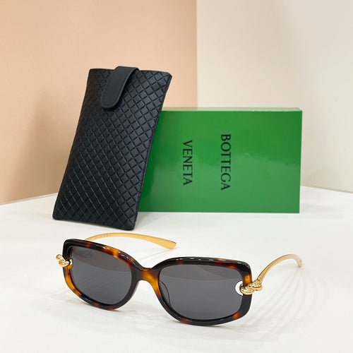 Bottega Veneta sunglasses, tortoise frames with dark brown lenses and gold hardware