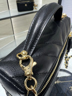 Chanel leather mini bag with gold chain and lobster clasp, black textured finish
