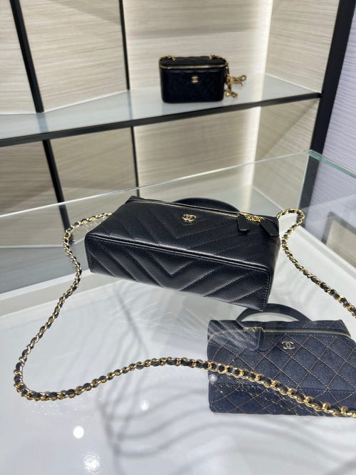 Chanel quilted mini bag with gold chain strap, black leather, top handle