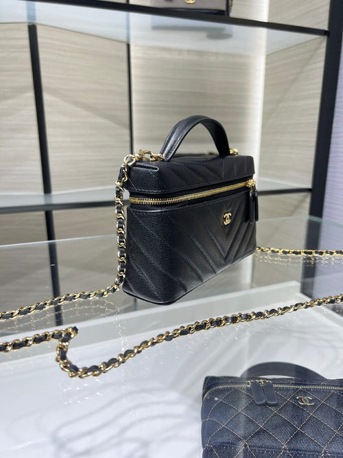 Chanel quilted mini handbag with chain strap, black leather, gold-tone hardware