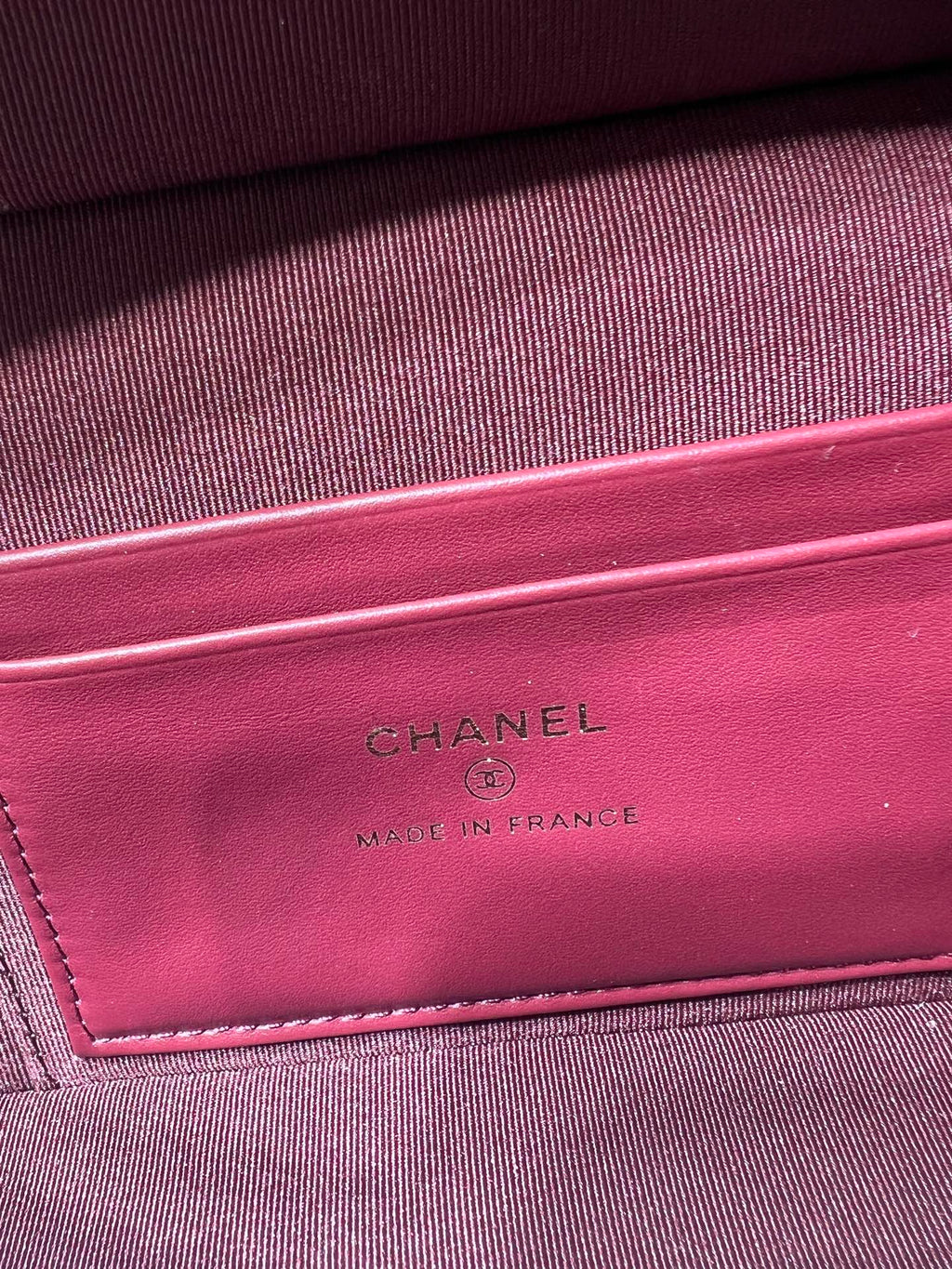Chanel burgundy interior lining with CHANEL and MADE IN FRANCE stamp