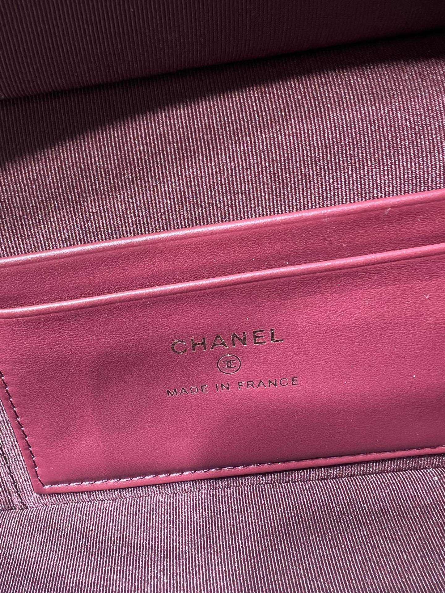 Chanel burgundy interior lining with CHANEL and MADE IN FRANCE stamp