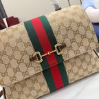 Gucci GG canvas flap bag with red and green stripe and gold horsebit-style closure