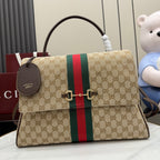 GG-print shoulder bag with green and red stripe and brown leather trim, front view