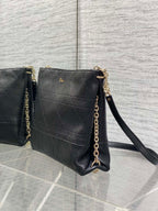 Dior quilted leather crossbody bag with shoulder strap and gold chain, dark.