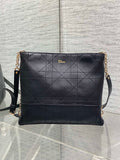 Dior quilted leather crossbody bag with chain strap and flap front, dark navy.