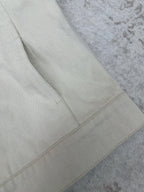 White jacket fabric with stitched seam panel