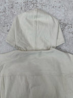 White jacket back with hood and central vertical seam