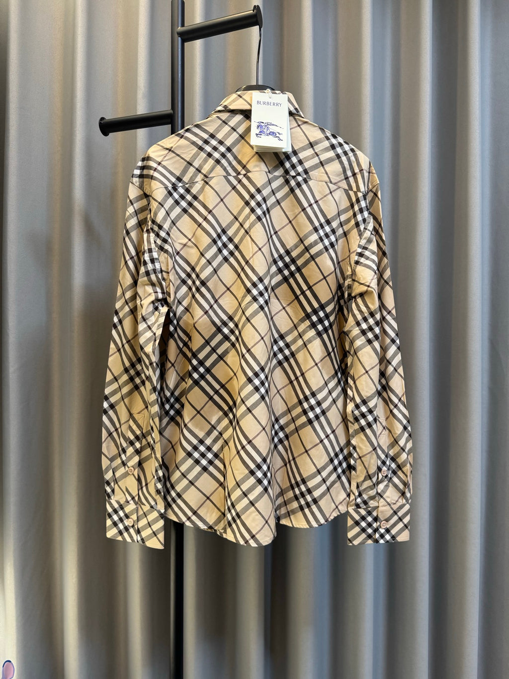 Burberry plaid long-sleeve shirt, back view with buttoned yoke