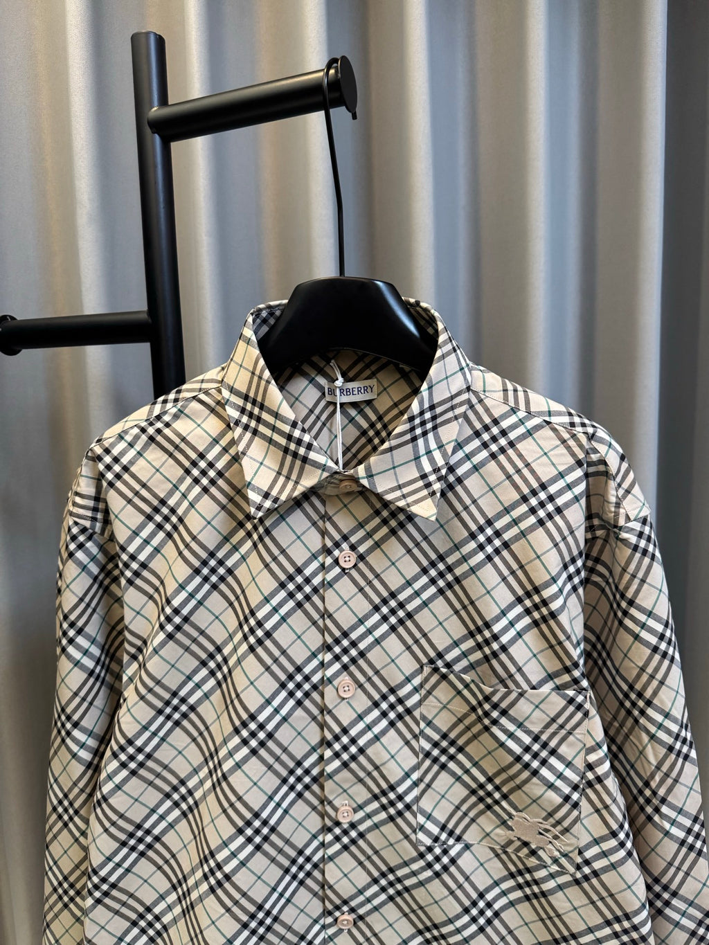 Burberry plaid button-up shirt with pointed collar and chest pocket