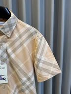 Burberry short-sleeve plaid shirt sleeve and side seam detail