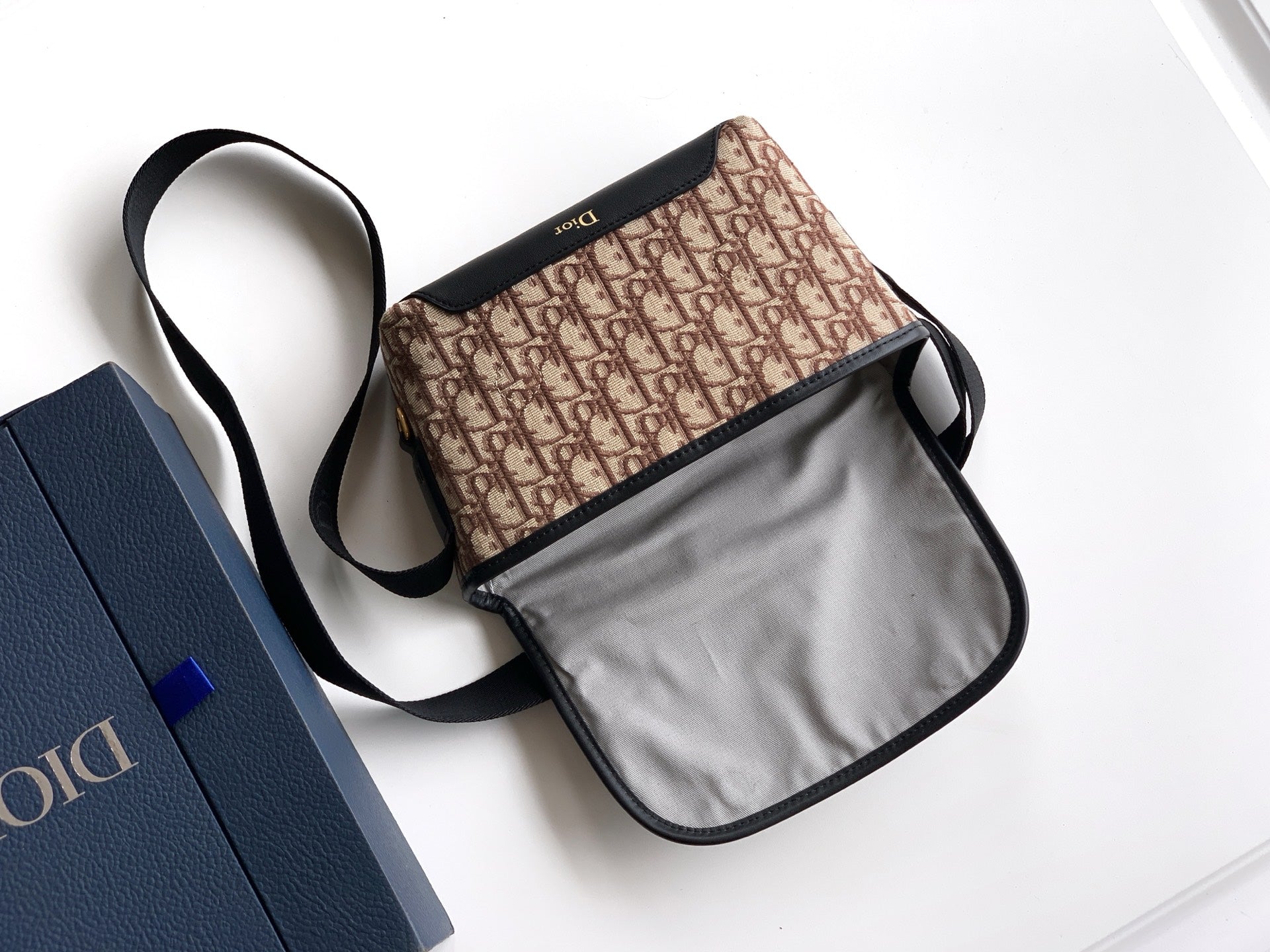 Dior mini crossbody bag beige monogram canvas with black flap and adjustable strap