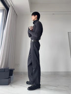 Dark gray wide-leg pants with belt and buckle