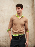 Black tailored pants with belt and silver buckle, straight-leg fit