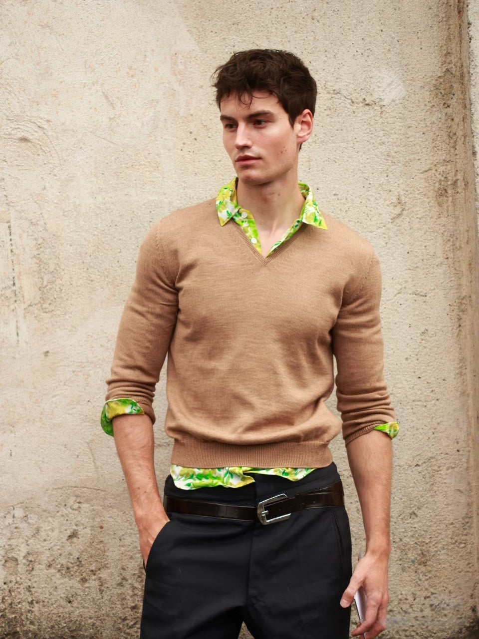 Black tailored pants with belt and silver buckle, straight-leg fit