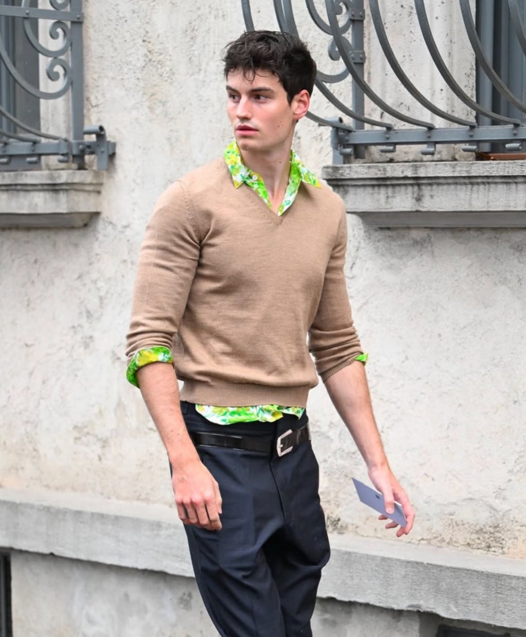 Black pants with belt and silver buckle, relaxed straight-leg fit