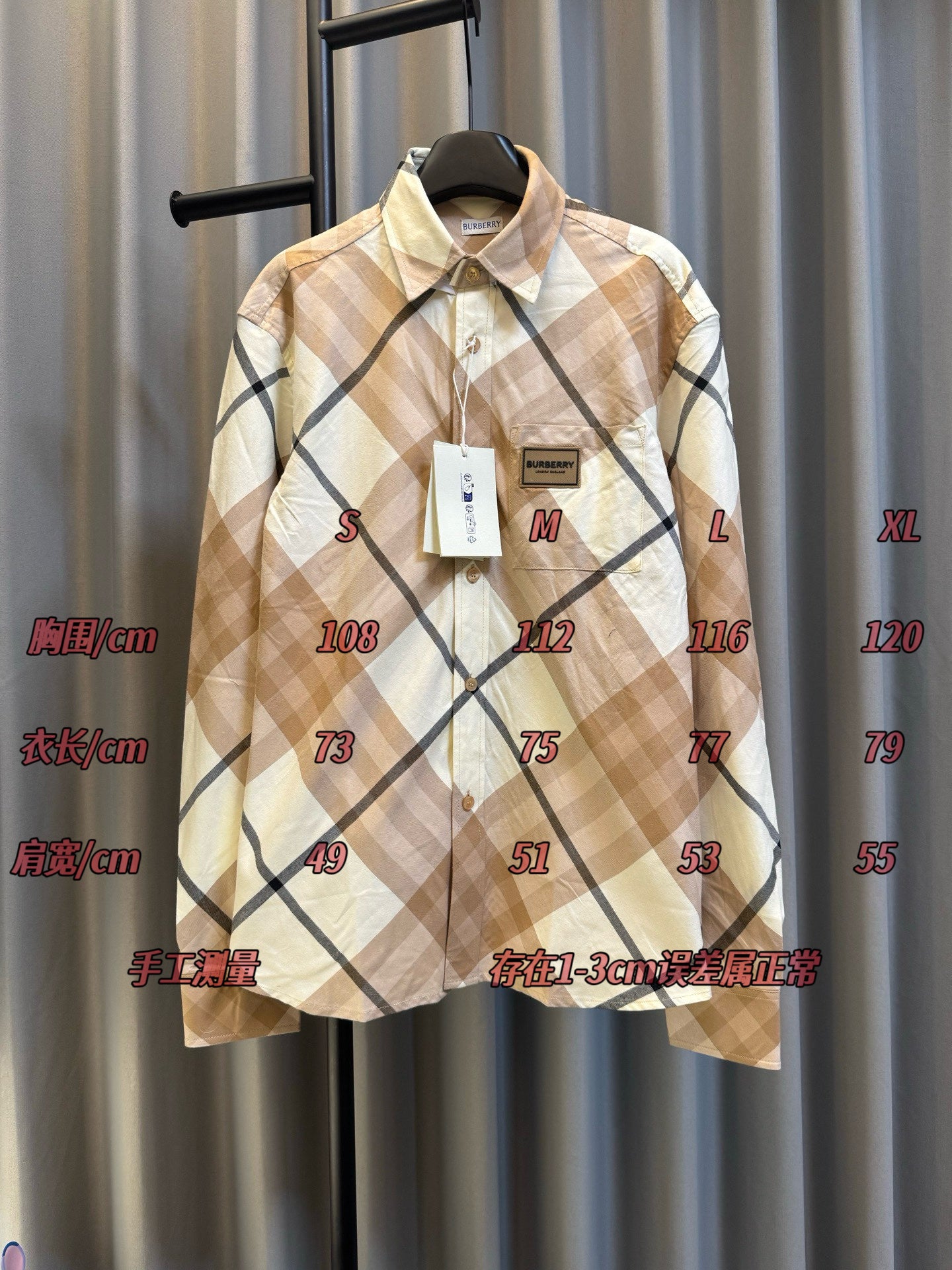 Burberry plaid long-sleeve button-up shirt, beige with navy diamond pattern on hanger