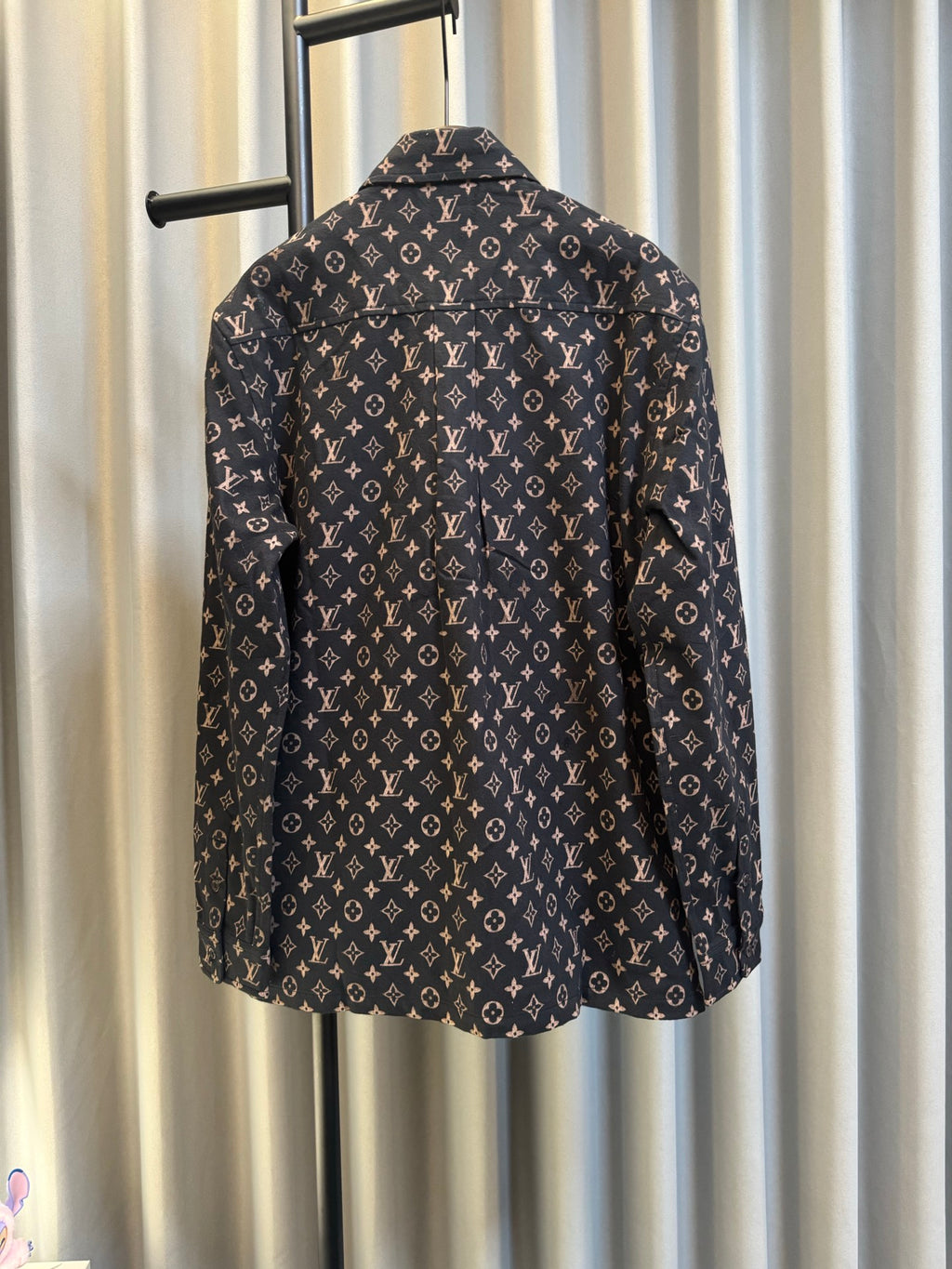 Long-sleeve jacket back view in dark navy with Louis Vuitton monogram print