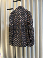 Long-sleeve jacket back view in dark navy with Louis Vuitton monogram print