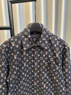 Long-sleeve jacket upper front in dark navy with Louis Vuitton monogram print, pointed collar