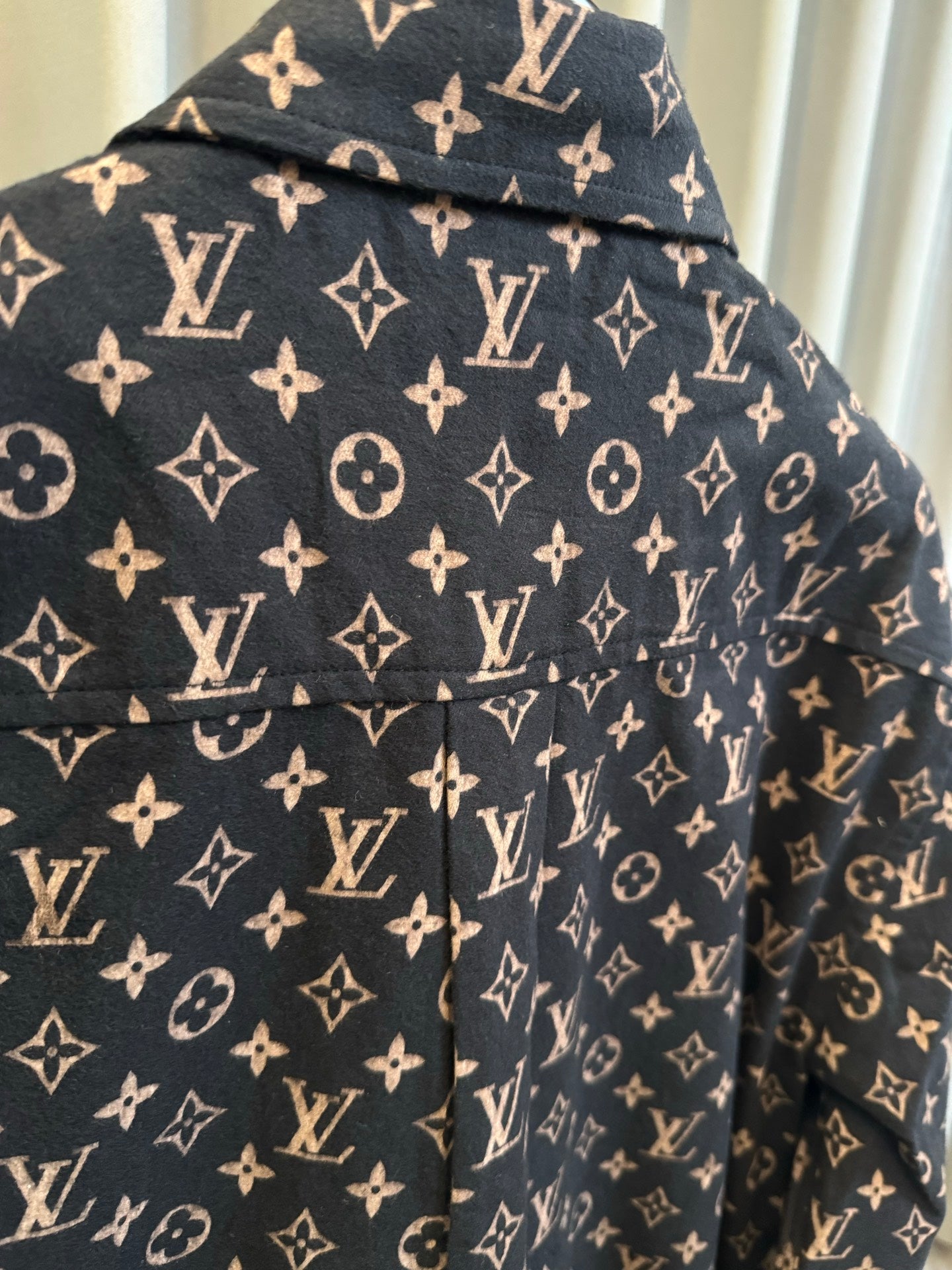 Long-sleeve jacket front and back yoke detail in dark navy with Louis Vuitton monogram print