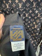 Long-sleeve jacket interior label area showing size S and Made in Italy on navy monogram